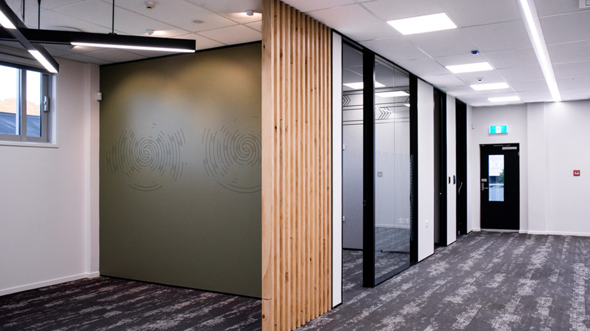 Meeting room and a timber batten feature in new office fitout